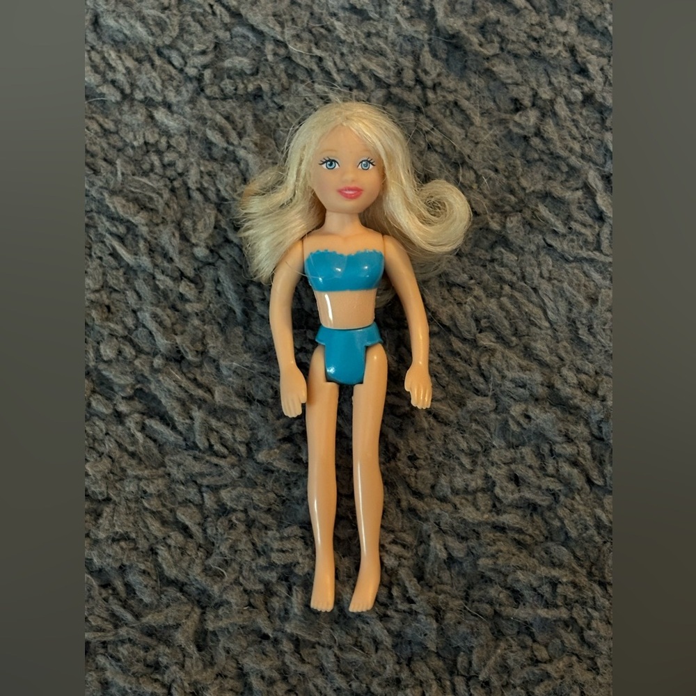 Lightly used Polly Pocket with blonde curl under hair & blue undergarments
